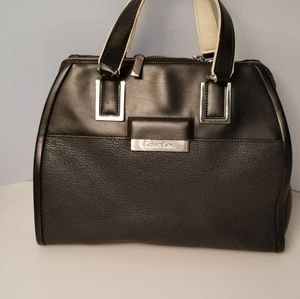 Calvin Klein tote. Black leather. Zip top
